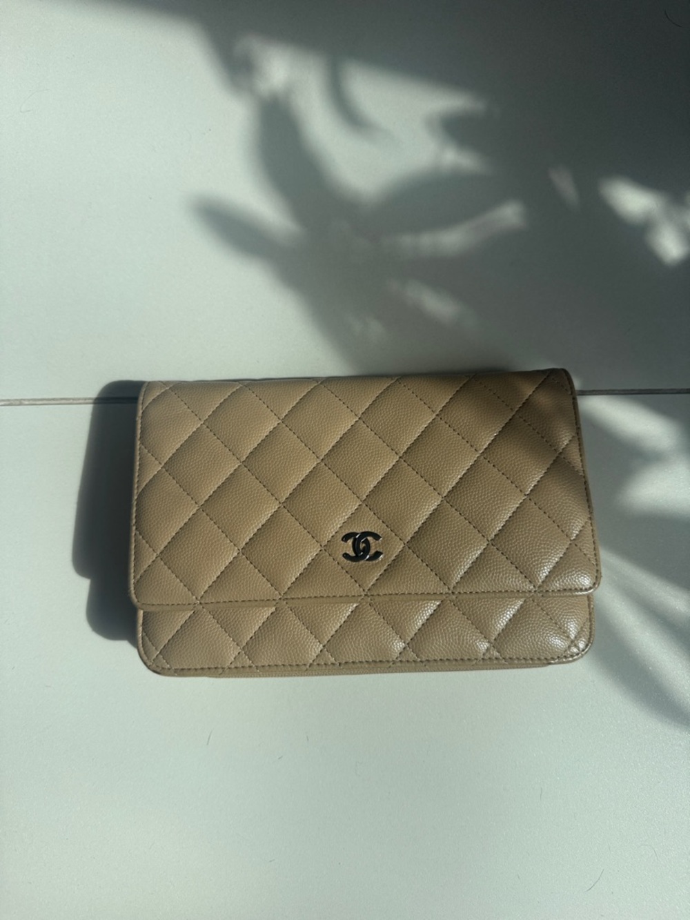 CHANEL Quilted Clutch in Taupe Beige Leather